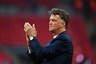 LONDON, ENGLAND - MAY 21:  Louis van Gaal Manager of Manchester United applauds the fans after winning The Emirates FA Cup Final match between Manchester United and Crystal Palace at Wembley Stadium on May 21, 2016 in London, England. Man Utd won 2-1 after extra time.  (Photo by Mike Hewitt/Getty Images)